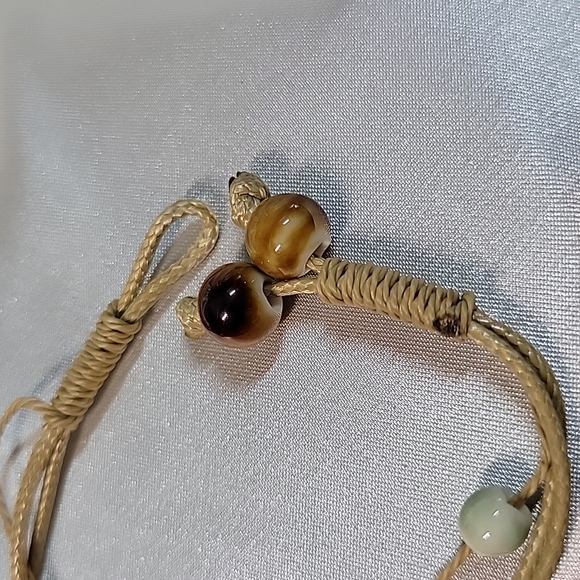 Hand-knotted Hemp Bracelet, ceramic beads, flower; charm, choice of color - Picture 4 of 6